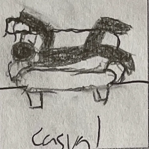 a person lying down on a couch, representing a casual energy.